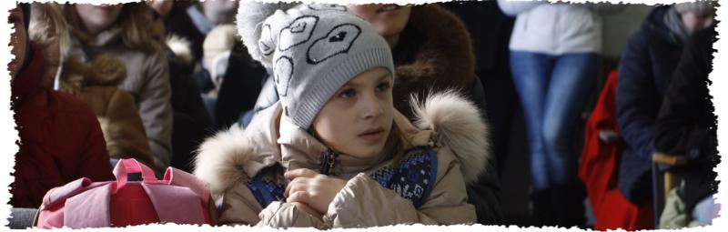 young girl wearing jacket and beenie