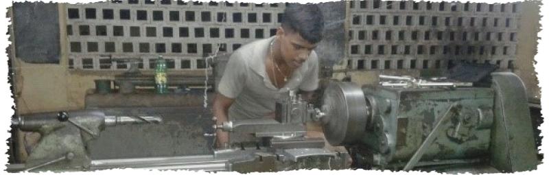 Sritharan working on machine