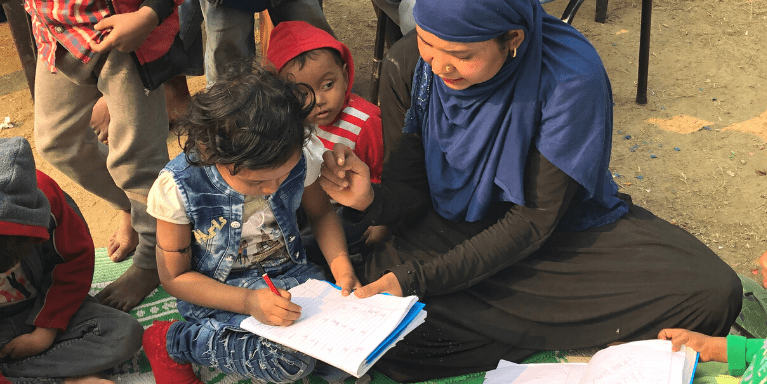 Fathima and her mom learn at a community center.