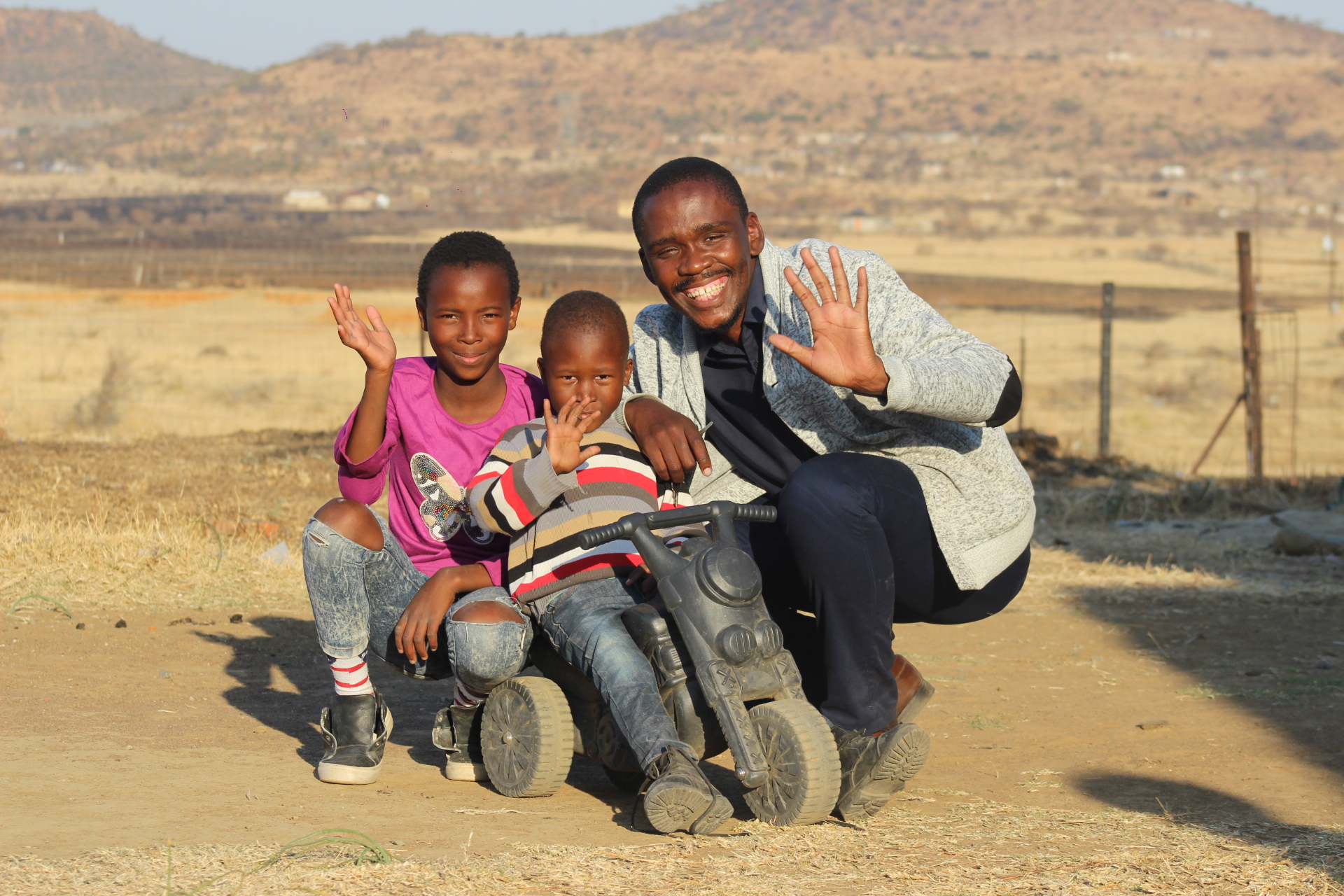 Children, Amahle and Siyanda, with a CERI staff member