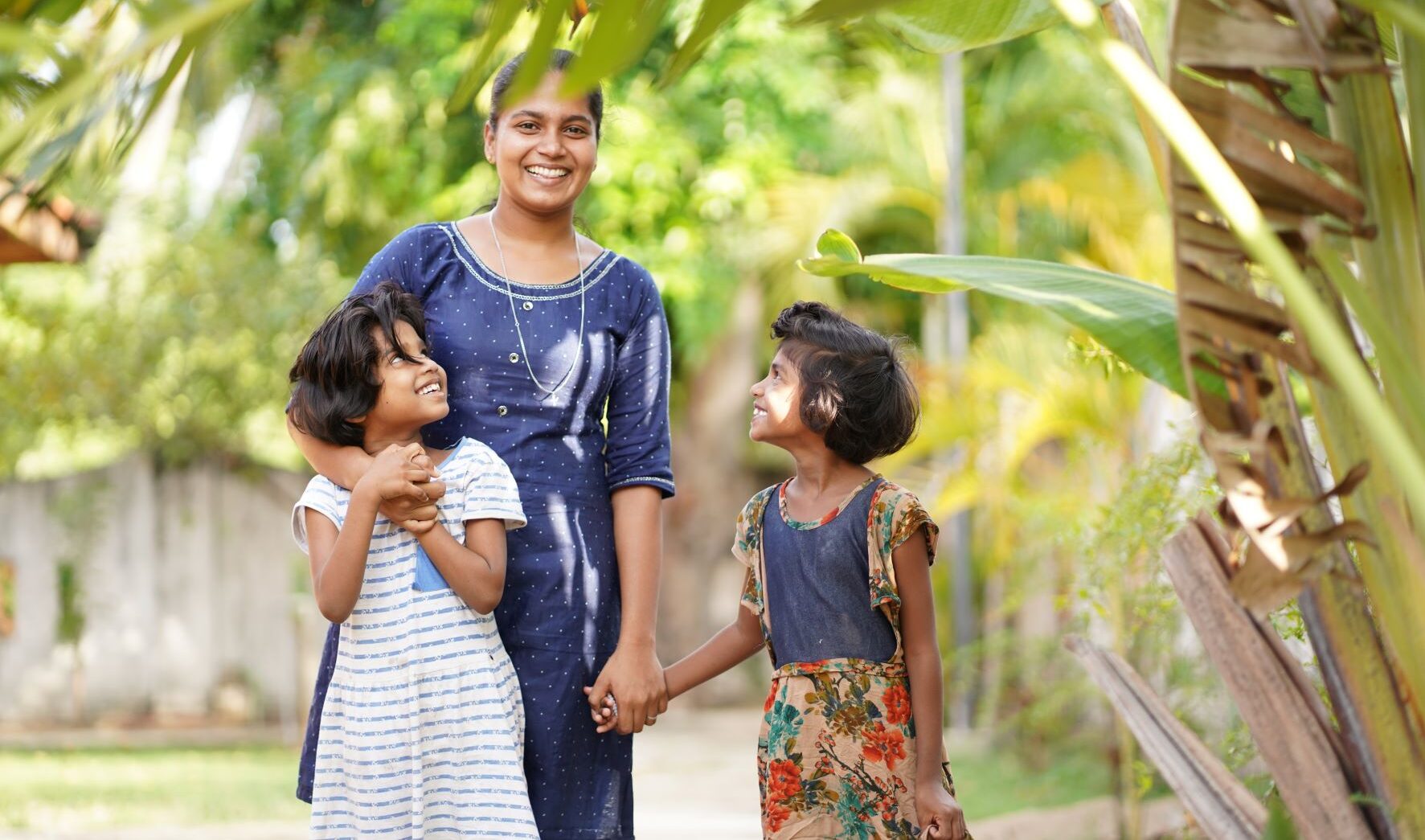 Renosha, a girl in Sri Lanka, with kids from the orphanage