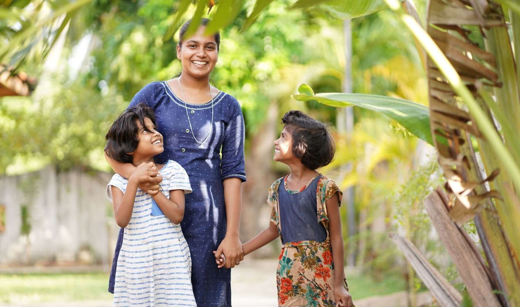 Renosha, a girl in Sri Lanka, with kids from the orphanage