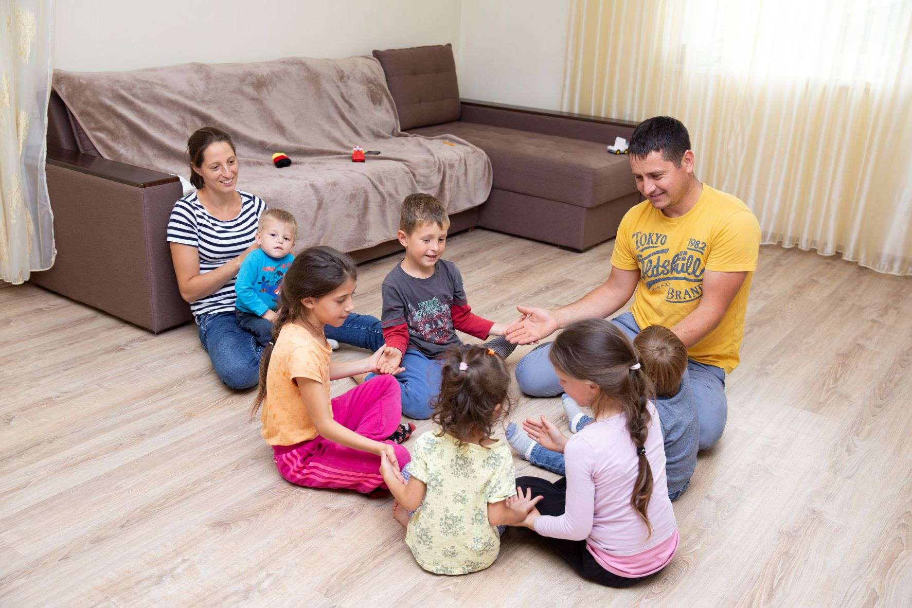 Moraru siblings with their foster family.