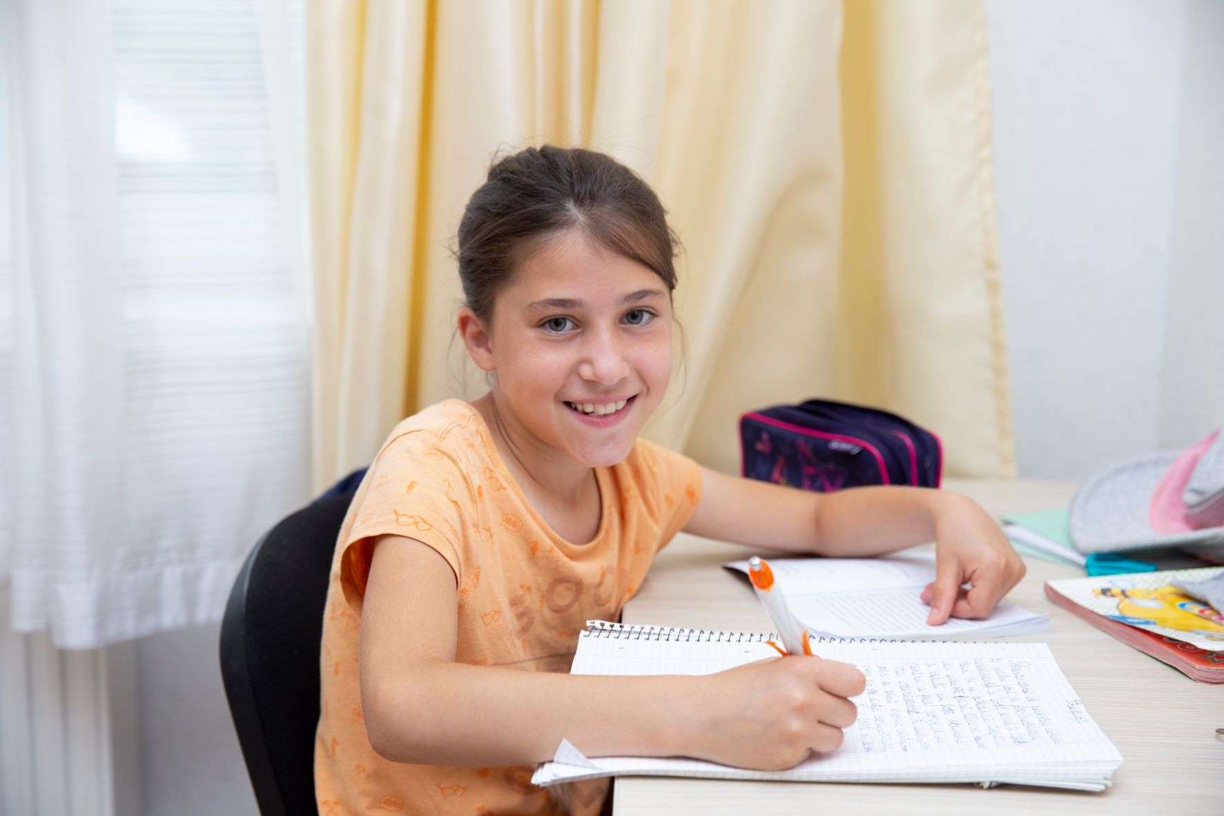 Eleonora studying at home.